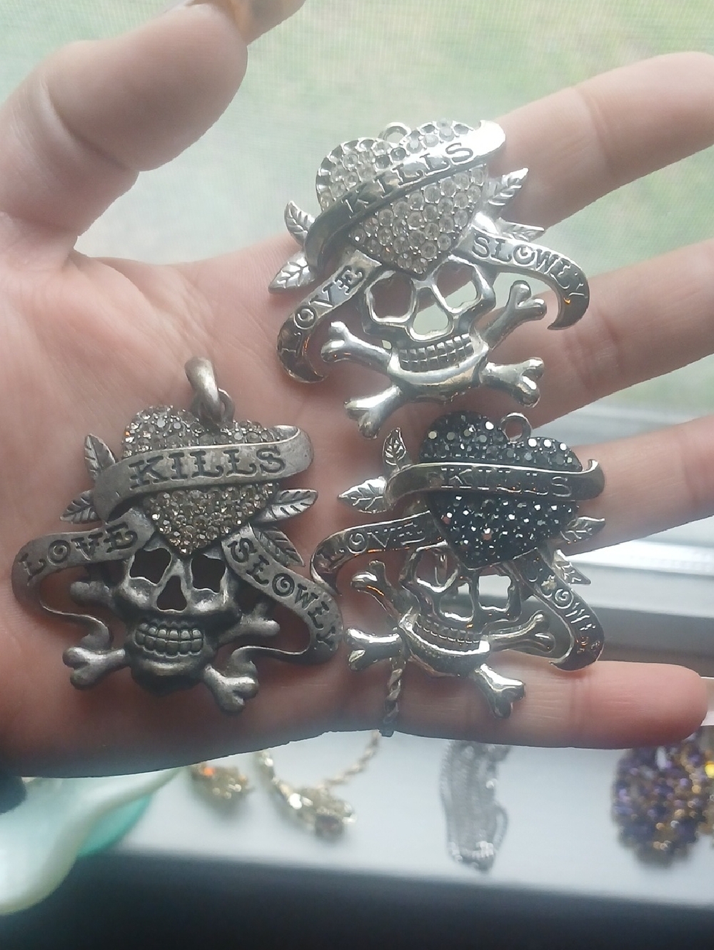 Love Kills Slowly Pendants